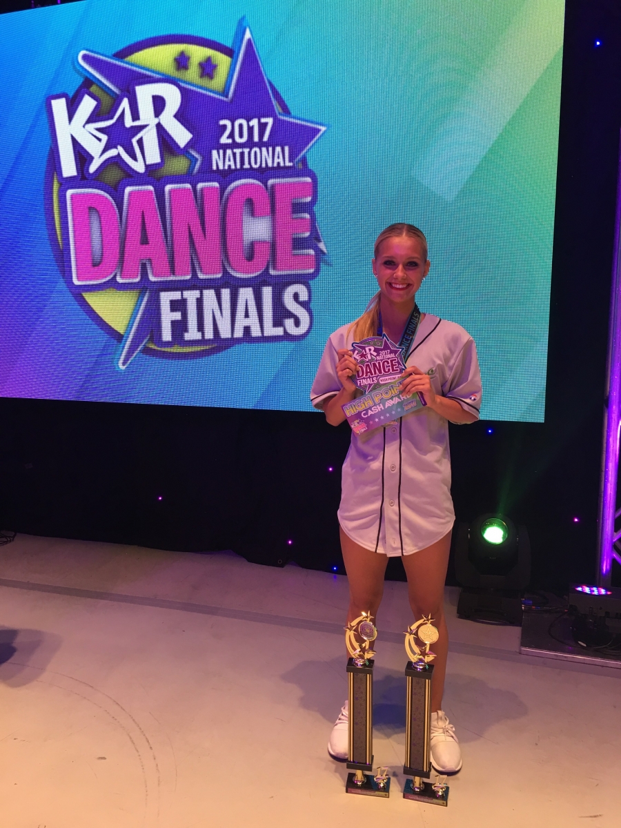 Fleming shows off her awards at nationals